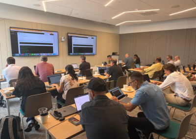 Engineers building working prototypes during the hands-on Claude Code training session